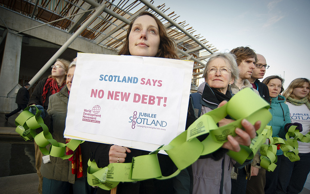Campaigners protest for grants rather than loans in response to climate change